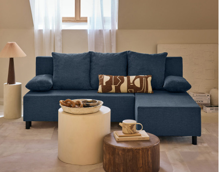 Canapé d'angle réversible 4 places convertible avec coffre en tissu texturé Gloria