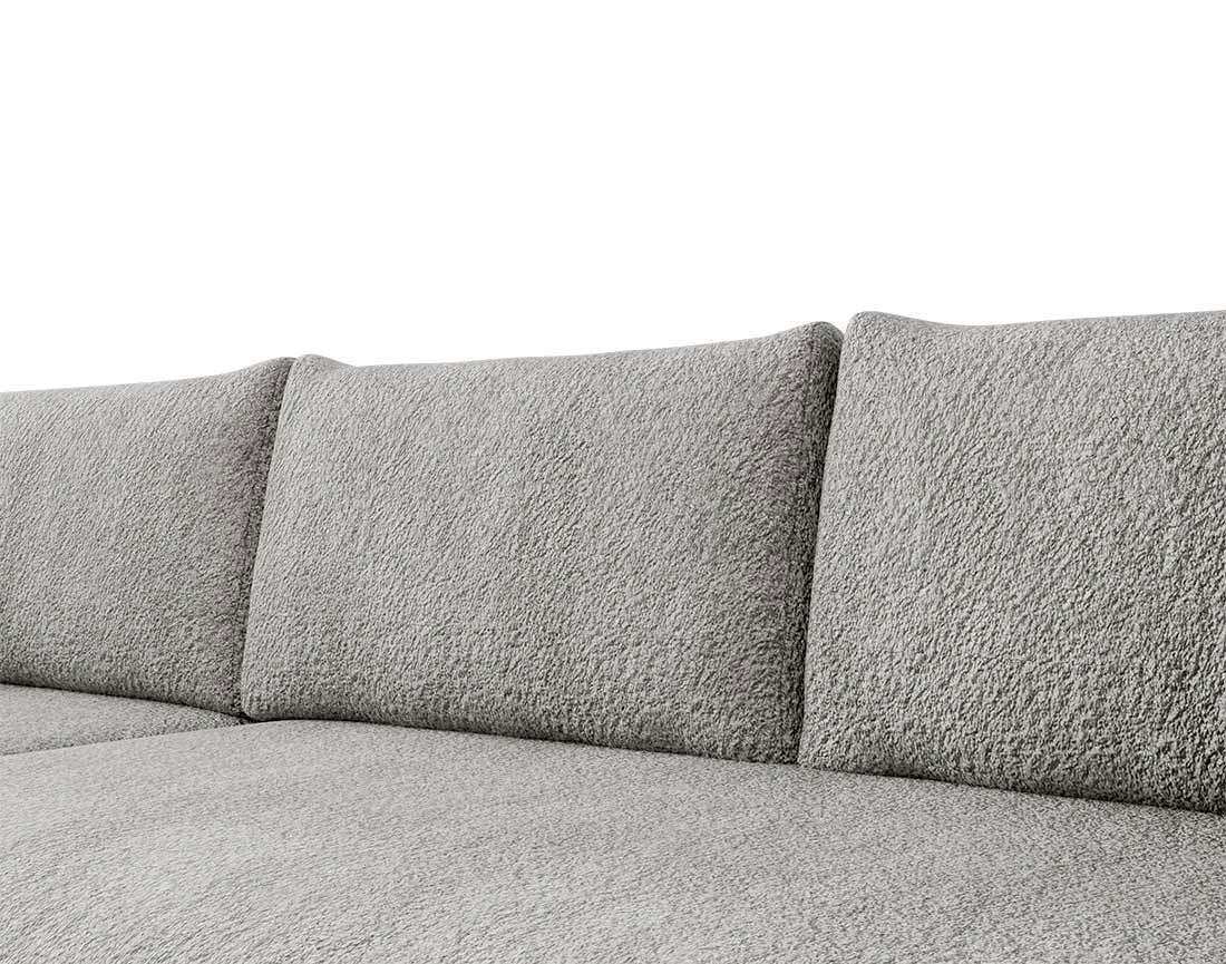 Canapé d'angle réversible 4 places convertible avec coffre en tissu bouclette Rosalie