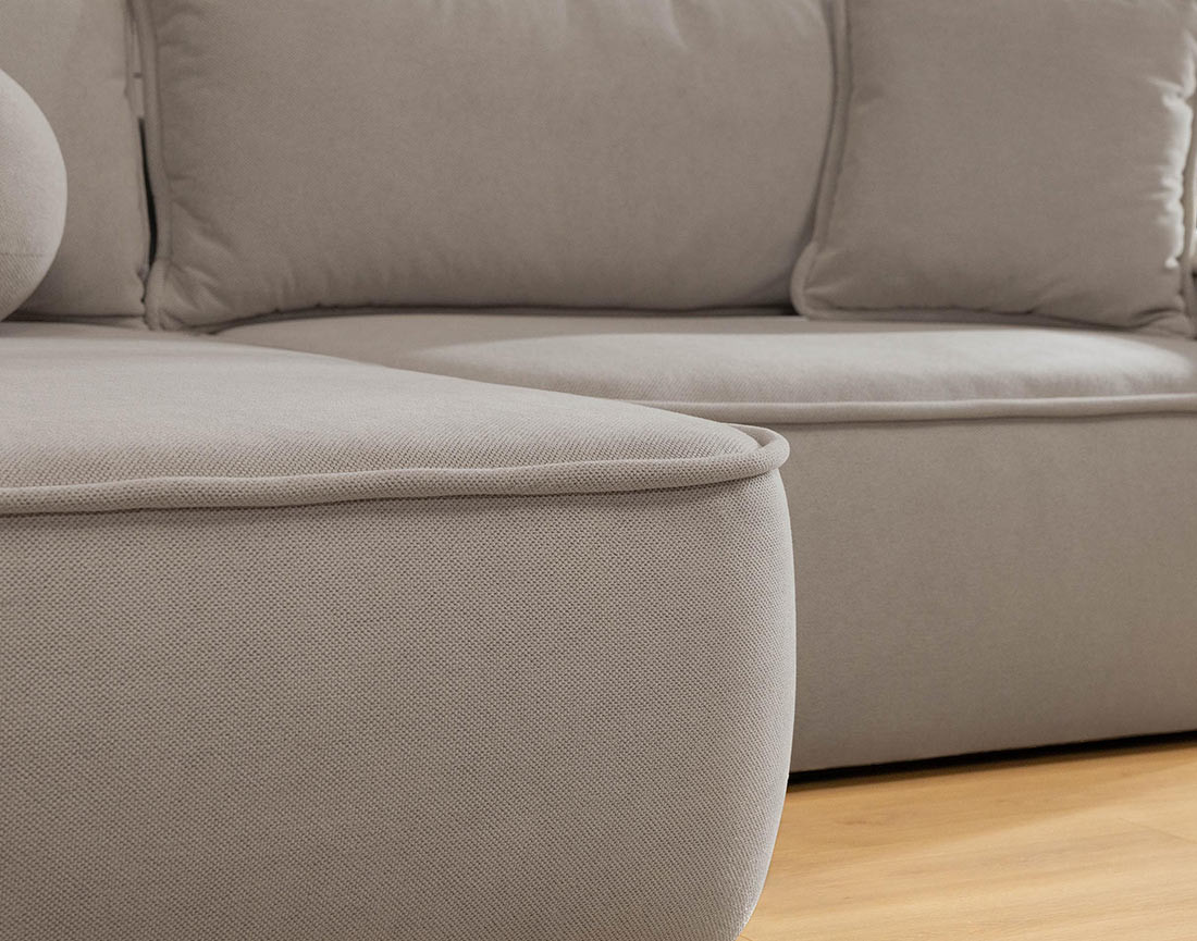 Canapé d'angle réversible 4 places convertible avec coffre en tissu texturé Enma