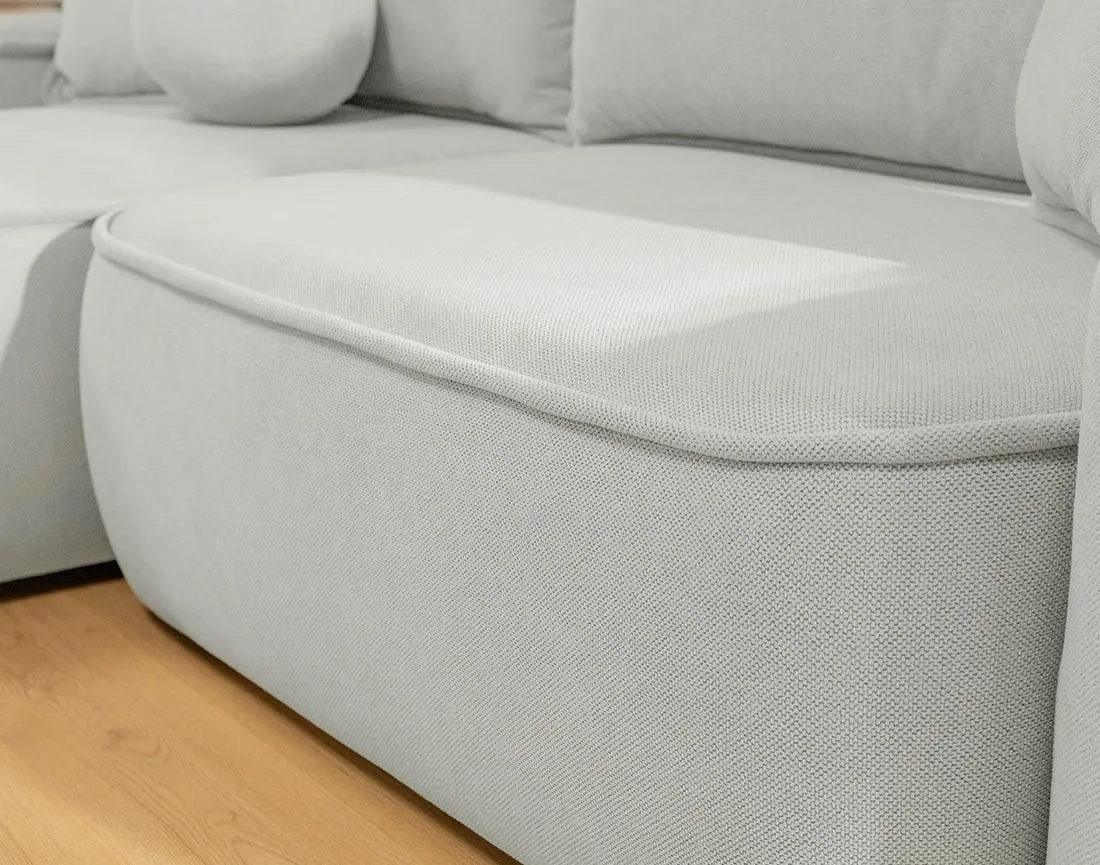 Canapé d'angle réversible 4 places convertible avec coffre en tissu texturé Enma