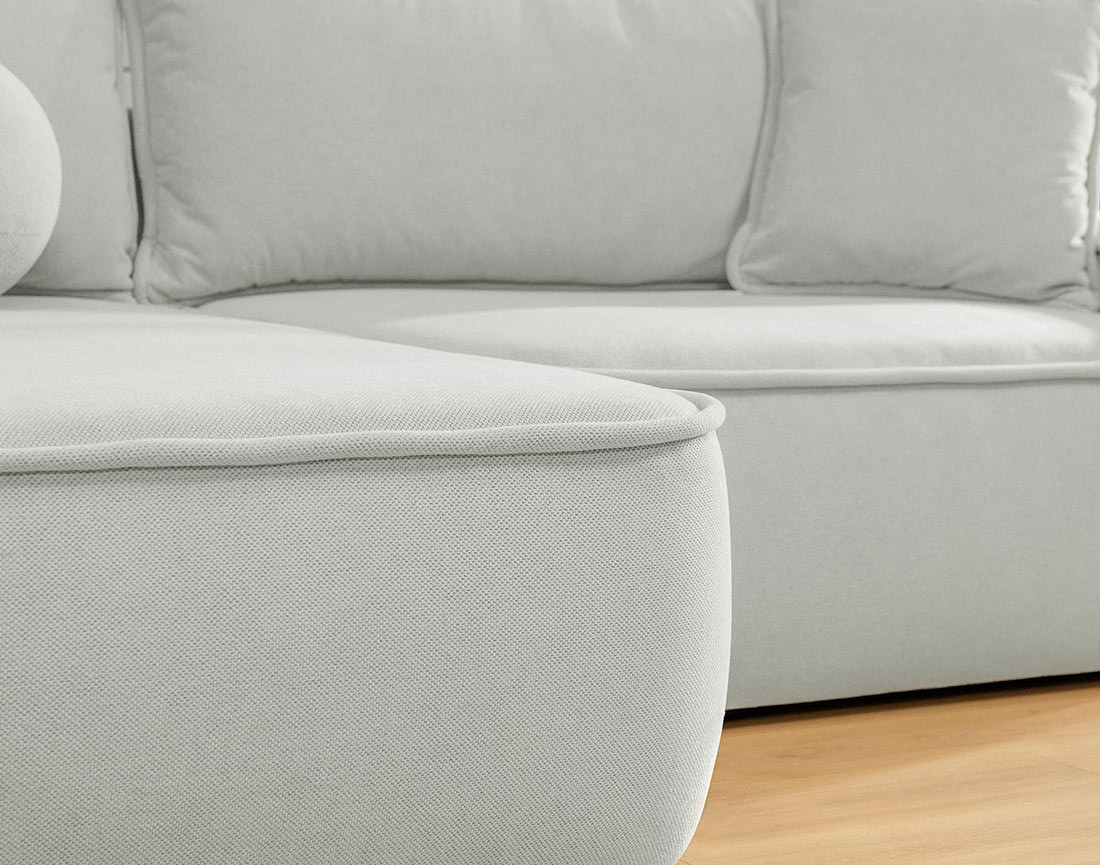 Canapé d'angle réversible 4 places convertible avec coffre en tissu texturé Enma