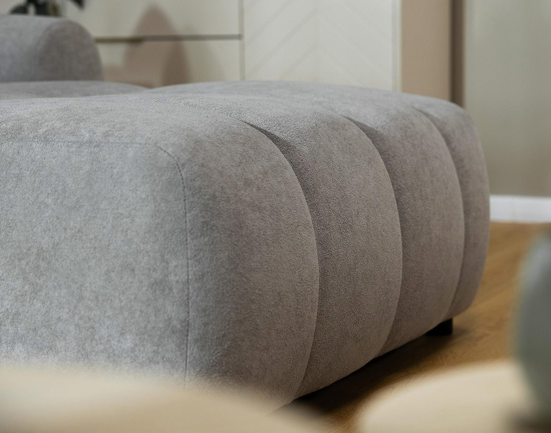 Canapé d'angle droit 4 places convertible avec coffre en tissu texturé Luzzio