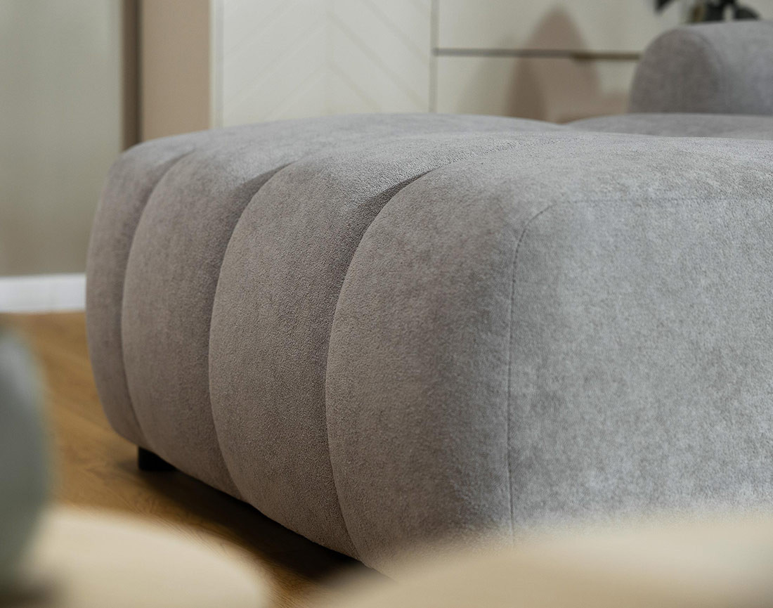 Canapé d'angle gauche 4 places convertible avec coffre en tissu texturé Luzzio