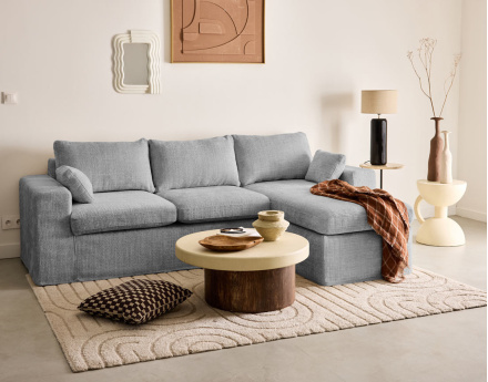 Canapé d'angle déhoussable et modulable 3 places et 1 pouf en velours texturé Calgary