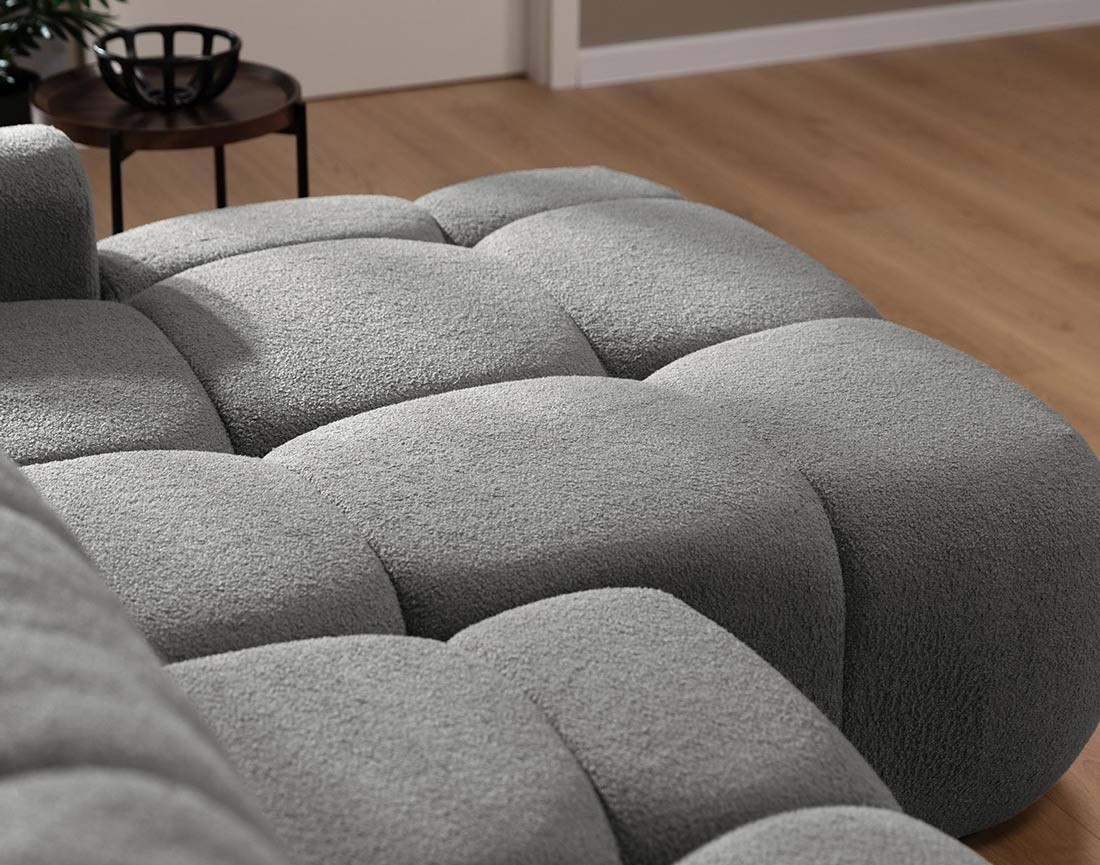 Canapé d'angle droit 4 places convertible avec coffre en tissu bouclette Yulin