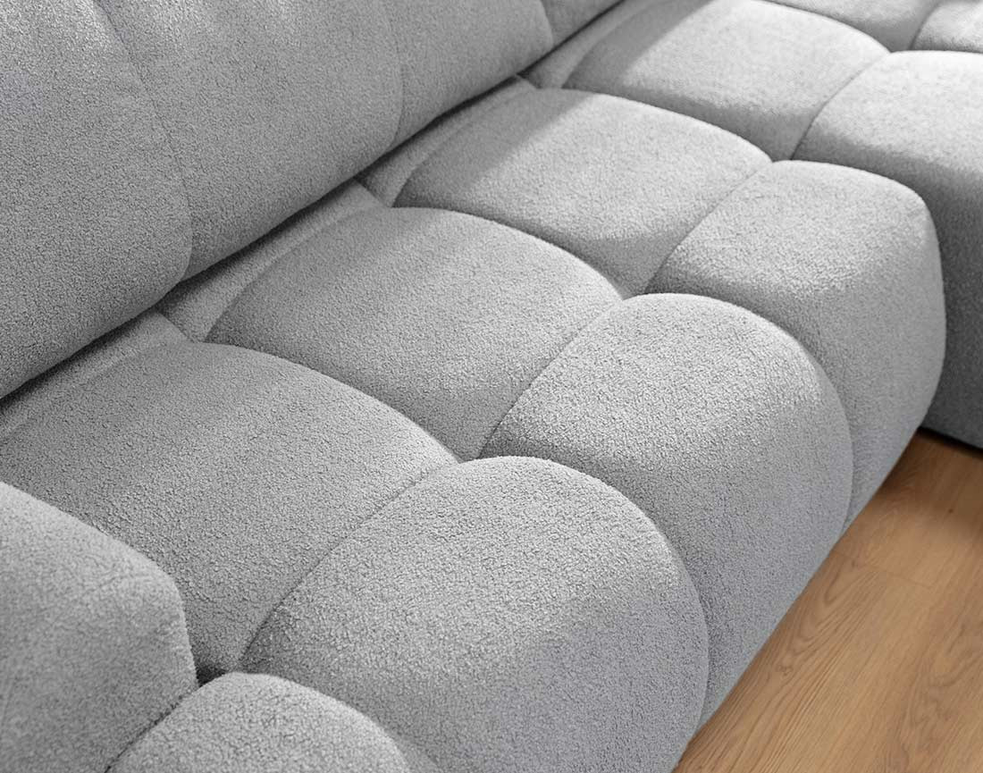 Canapé d'angle droit 4 places convertible avec coffre en tissu bouclette Yulin