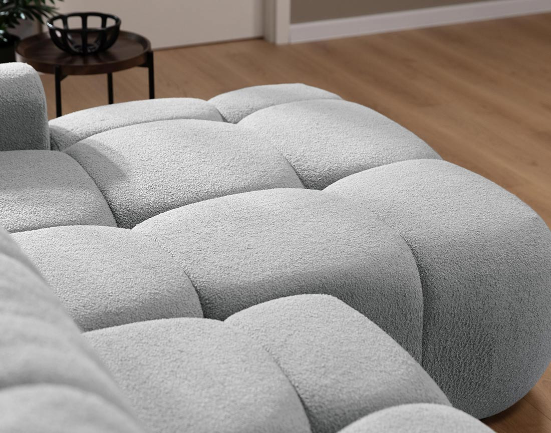 Canapé d'angle droit 4 places convertible avec coffre en tissu bouclette Yulin