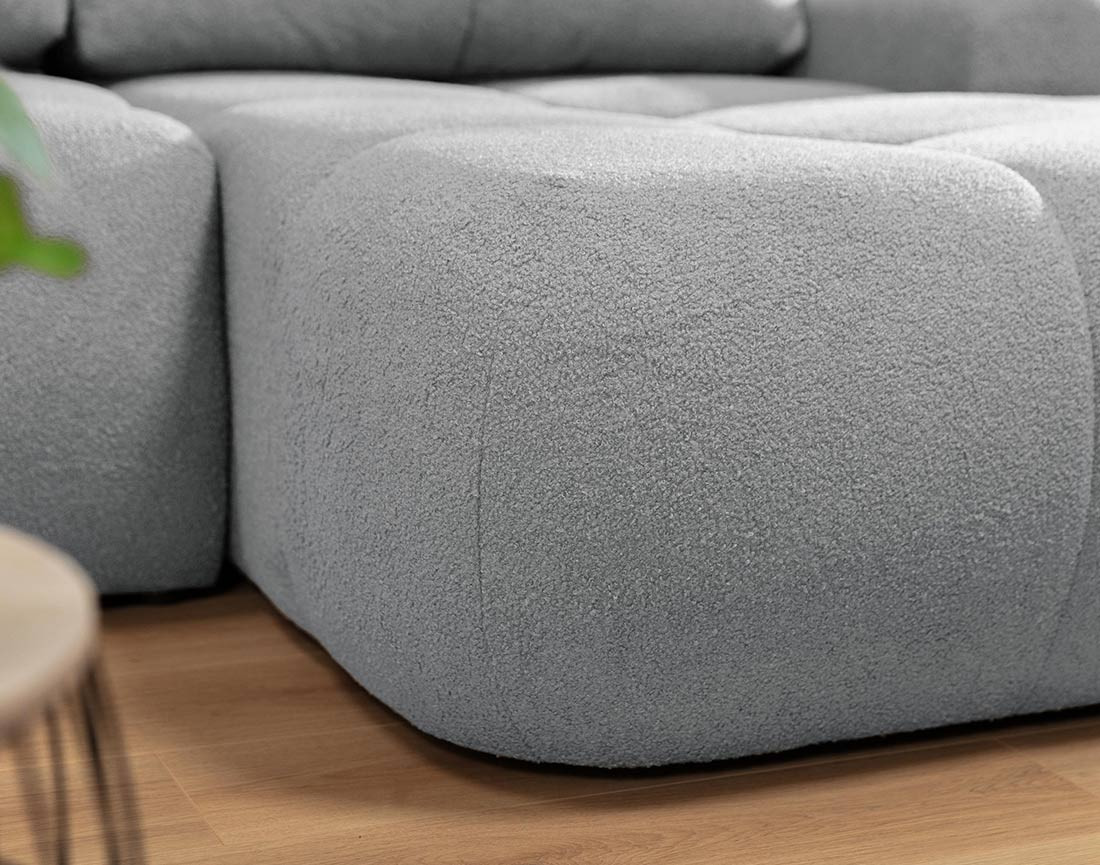 Canapé d'angle droit 4 places convertible avec coffre en tissu bouclette Yulin