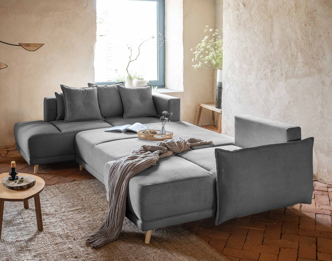 Canapé panoramique d'angle gauche 7 places convertible avec coffre en velours côtelé Lena