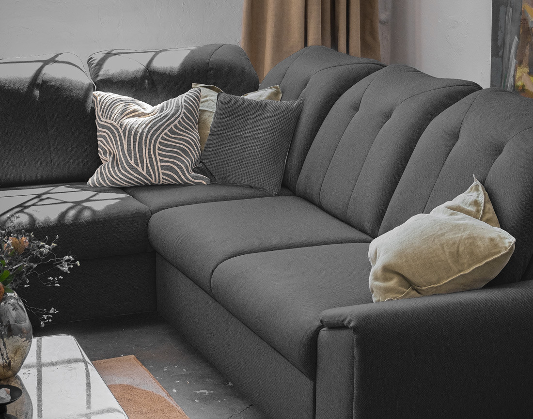 Canapé d'angle gauche 5 places convertible avec coffre et têtières en tissu Paul