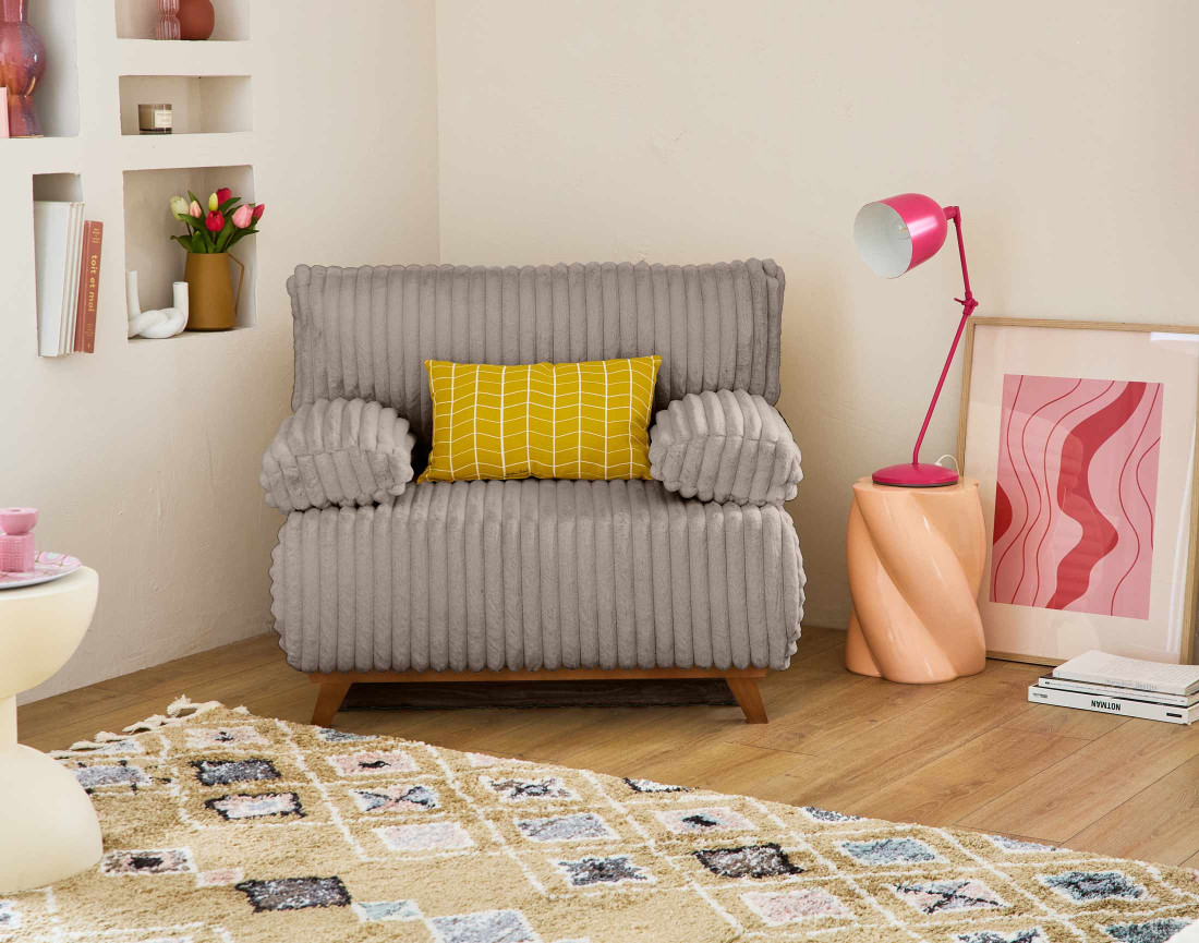 Fauteuil convertible avec coffre en fausse fourrure côtelée Cristal