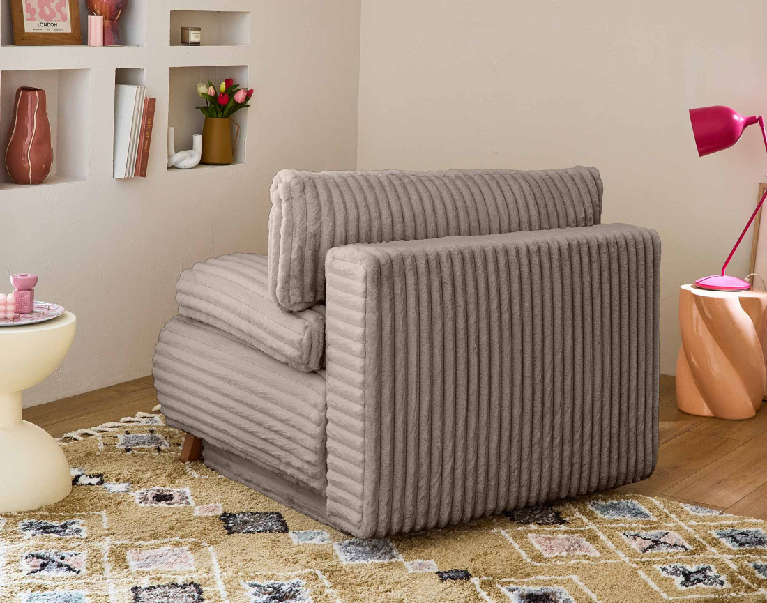 Fauteuil convertible avec coffre en fausse fourrure côtelée Cristal