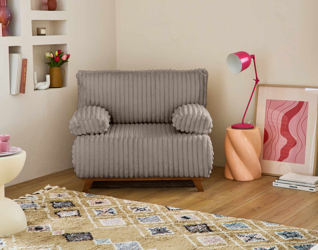 Fauteuil convertible avec coffre en fausse fourrure côtelée Cristal