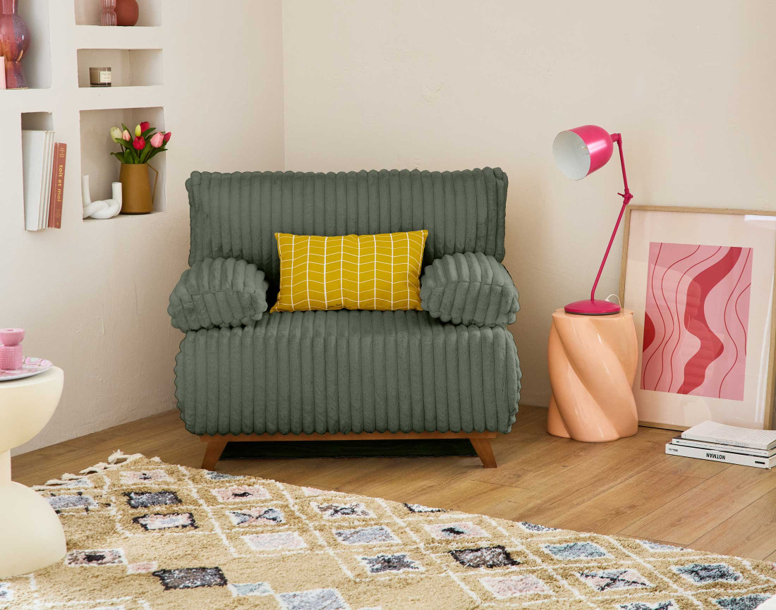 Fauteuil convertible avec coffre en fausse fourrure côtelée Cristal