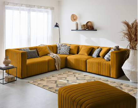 Canapé modulable d'angle réversible 6 places avec pouf d'appoint en velours Nova