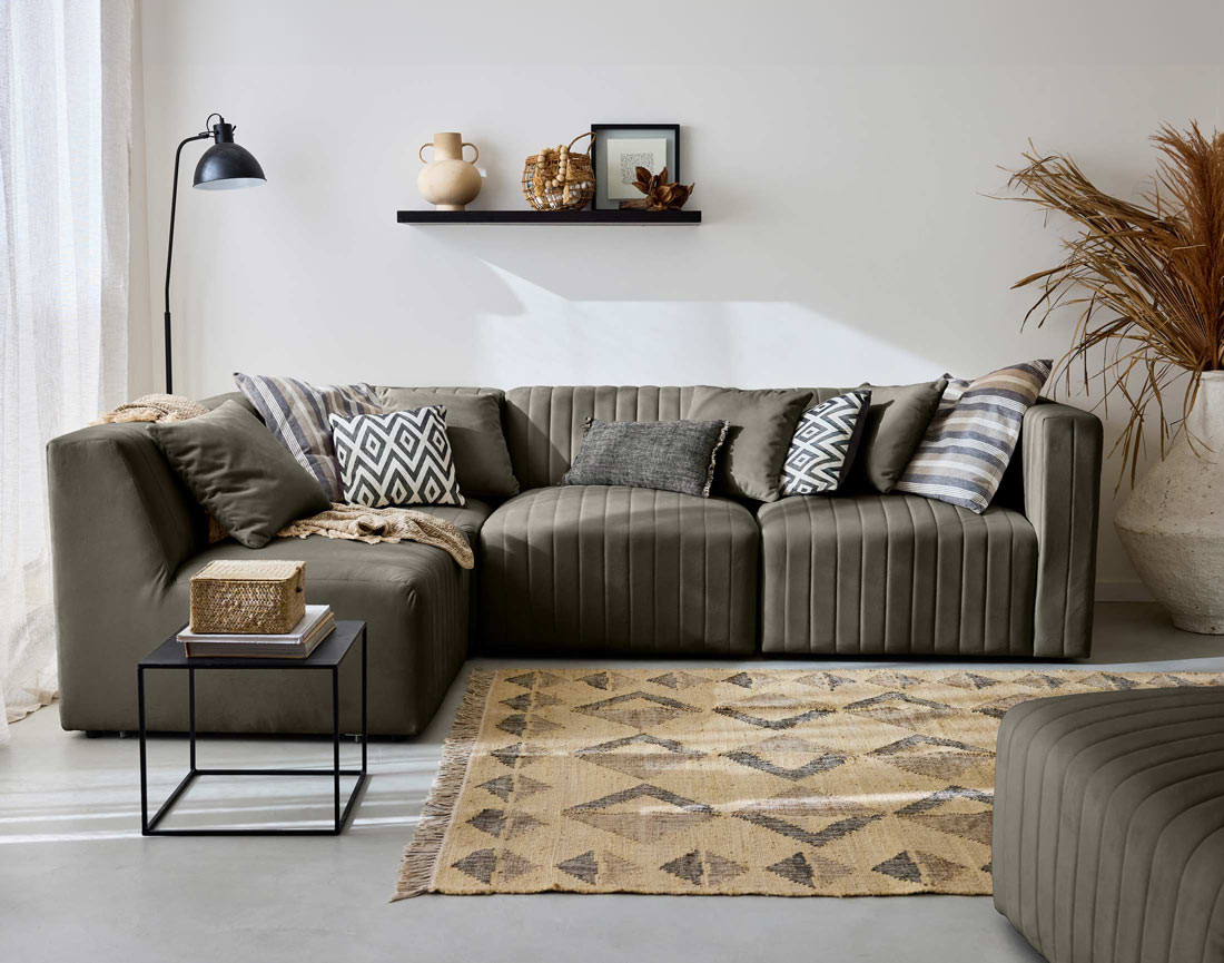 Canapé modulable d'angle gauche 5 places avec pouf d'appoint en velours Nova