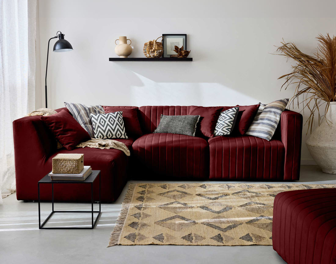 Canapé modulable d'angle gauche 5 places avec pouf d'appoint en velours Nova