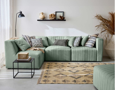 Canapé modulable d'angle gauche 5 places avec pouf d'appoint en velours Nova