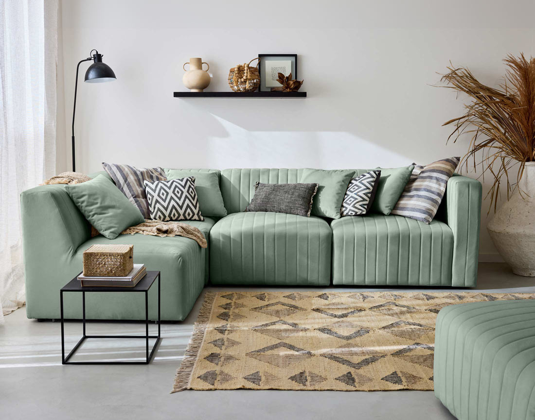 Canapé modulable d'angle gauche 5 places avec pouf d'appoint en velours Nova
