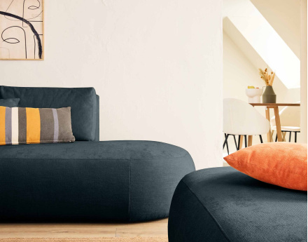 Canapé modulable d'angle gauche 4 places avec pouf en tissu texturé Santorini