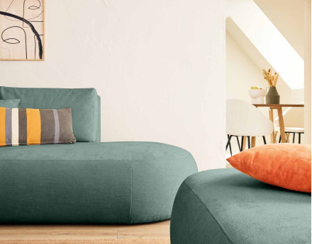 Canapé modulable d'angle gauche 4 places avec pouf en tissu texturé Santorini