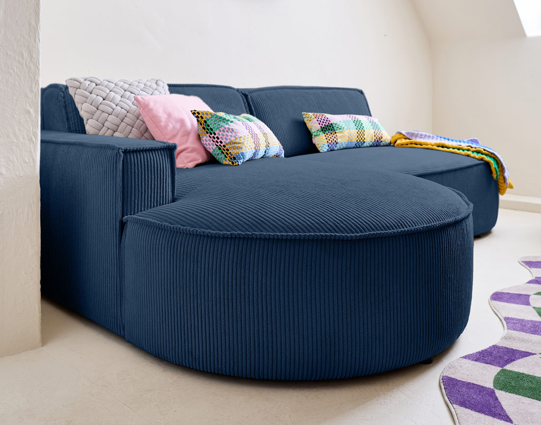 Canapé d'angle gauche aux formes arrondies 4 places en velours côtelé Spiaggia