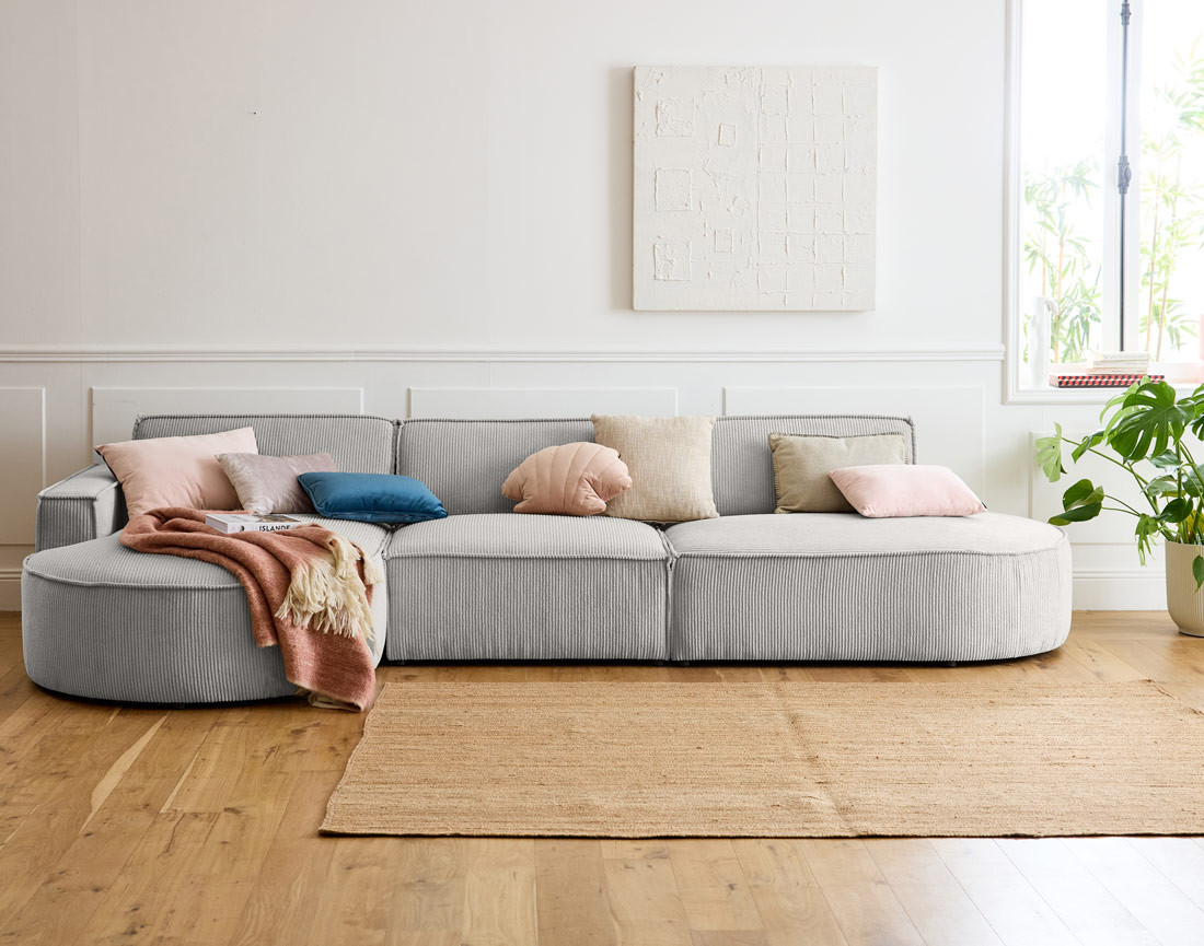 Canapé d'angle gauche aux formes arrondies 5 places en velours côtelé Spiaggia
