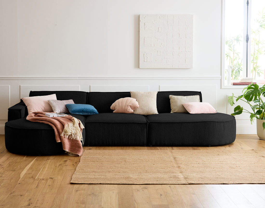 Canapé d'angle gauche aux formes arrondies 5 places en velours côtelé Spiaggia