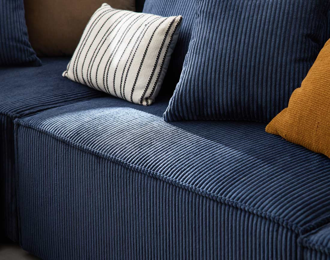 Canapé modulable panoramique 7 places en velours côtelé Colombine