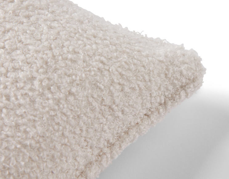 Coussin en tissu bouclette...