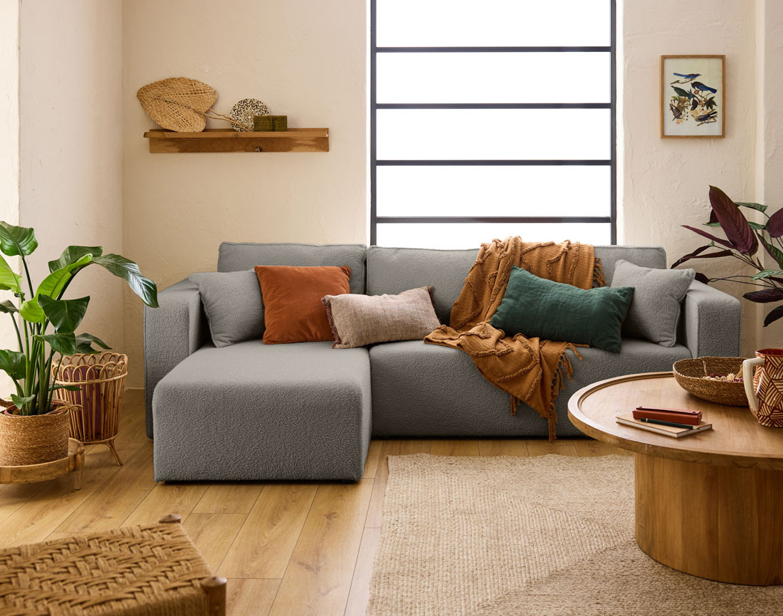 Canapé d'angle 4 places convertible avec coffre en tissu bouclette Topaze