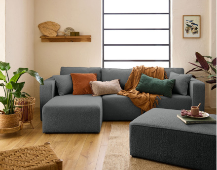 Canapé d'angle 4 places convertible avec coffre en tissu bouclette Topaze