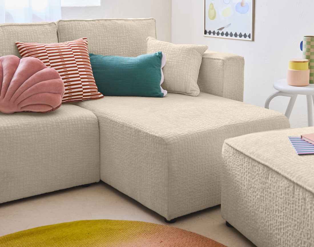 Canapé d'angle réversible 4 places convertible avec coffre en tissu velours relief Topaze