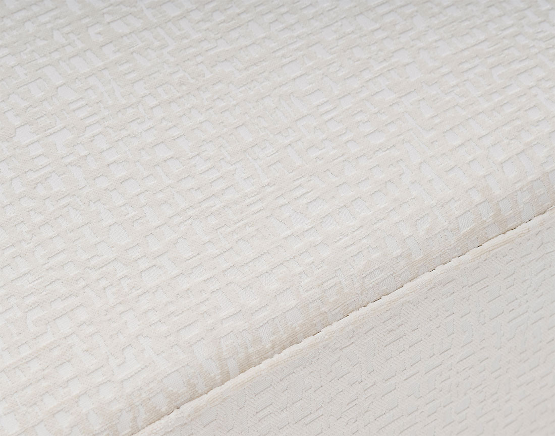 Pouf en tissu velours relief