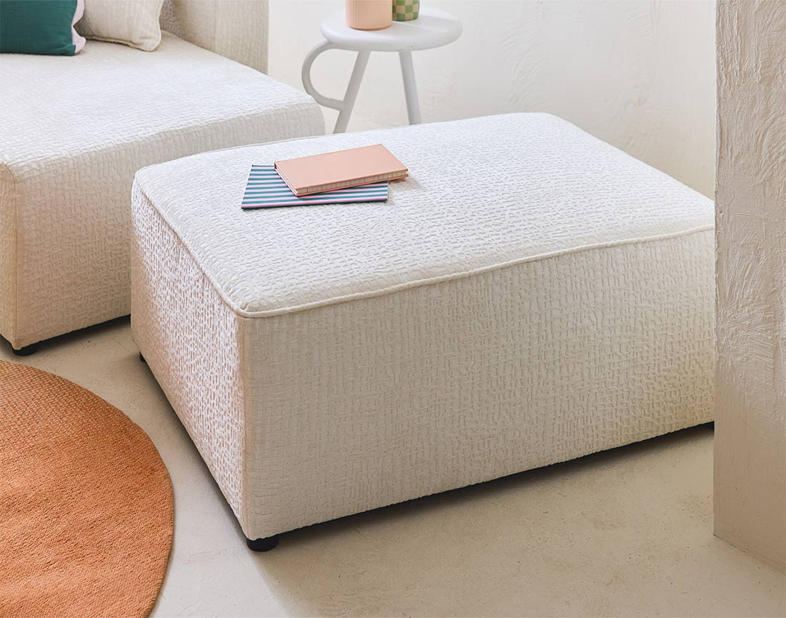 Pouf en tissu velours relief