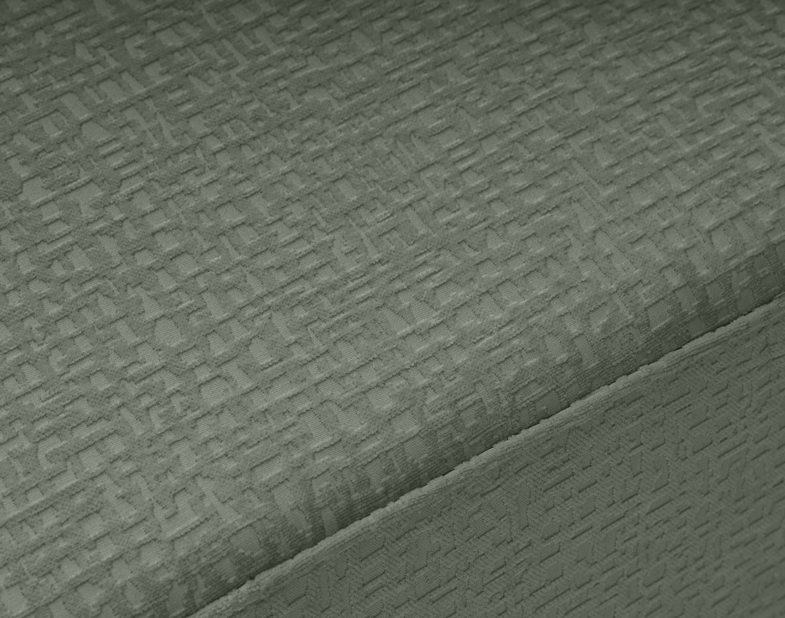 Pouf en tissu velours relief