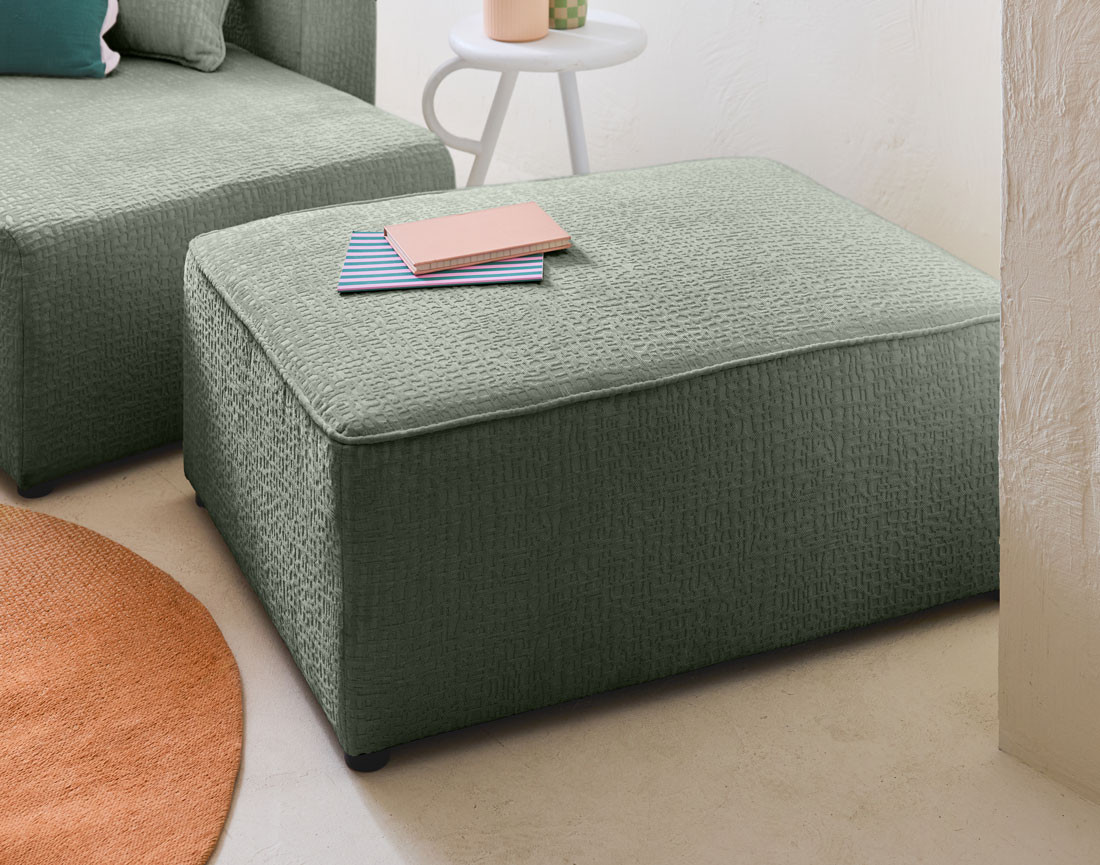 Pouf en tissu velours relief