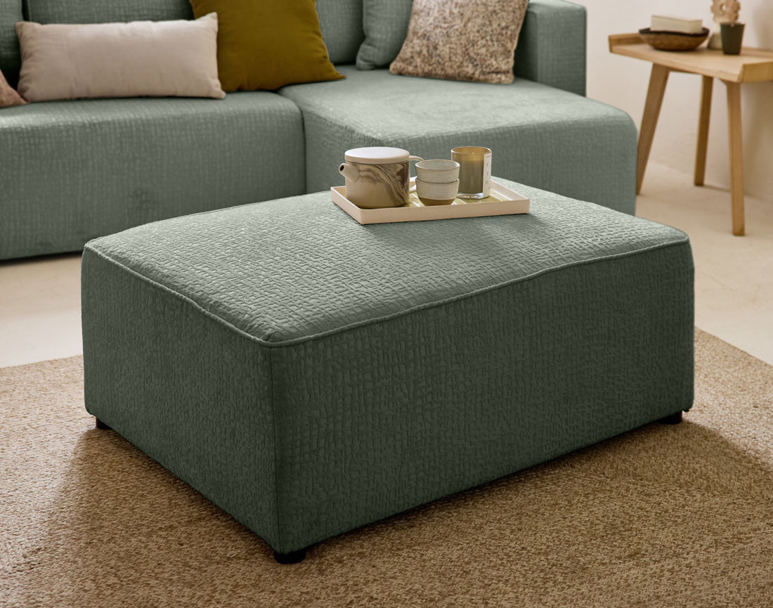 Pouf en tissu velours relief