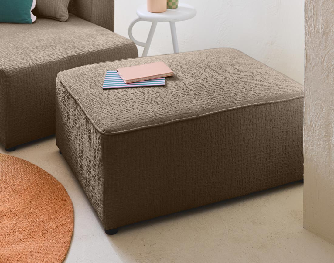 Pouf en tissu velours relief