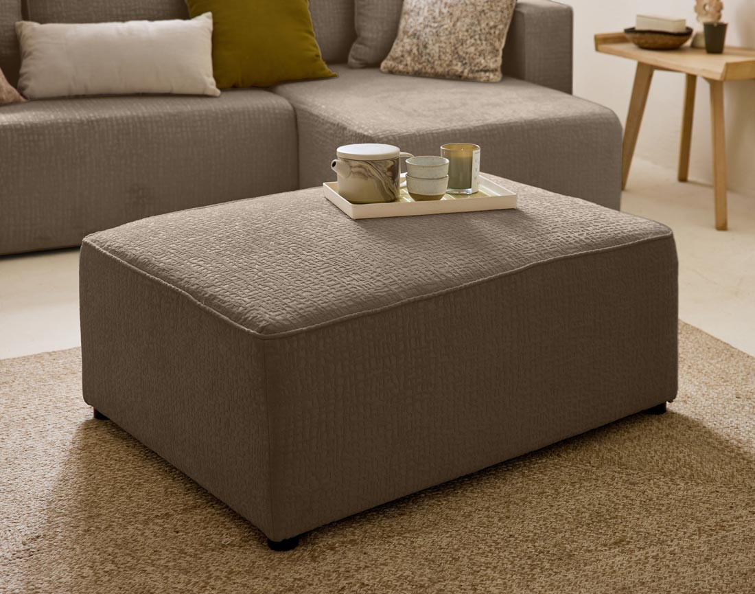 Pouf en tissu velours relief