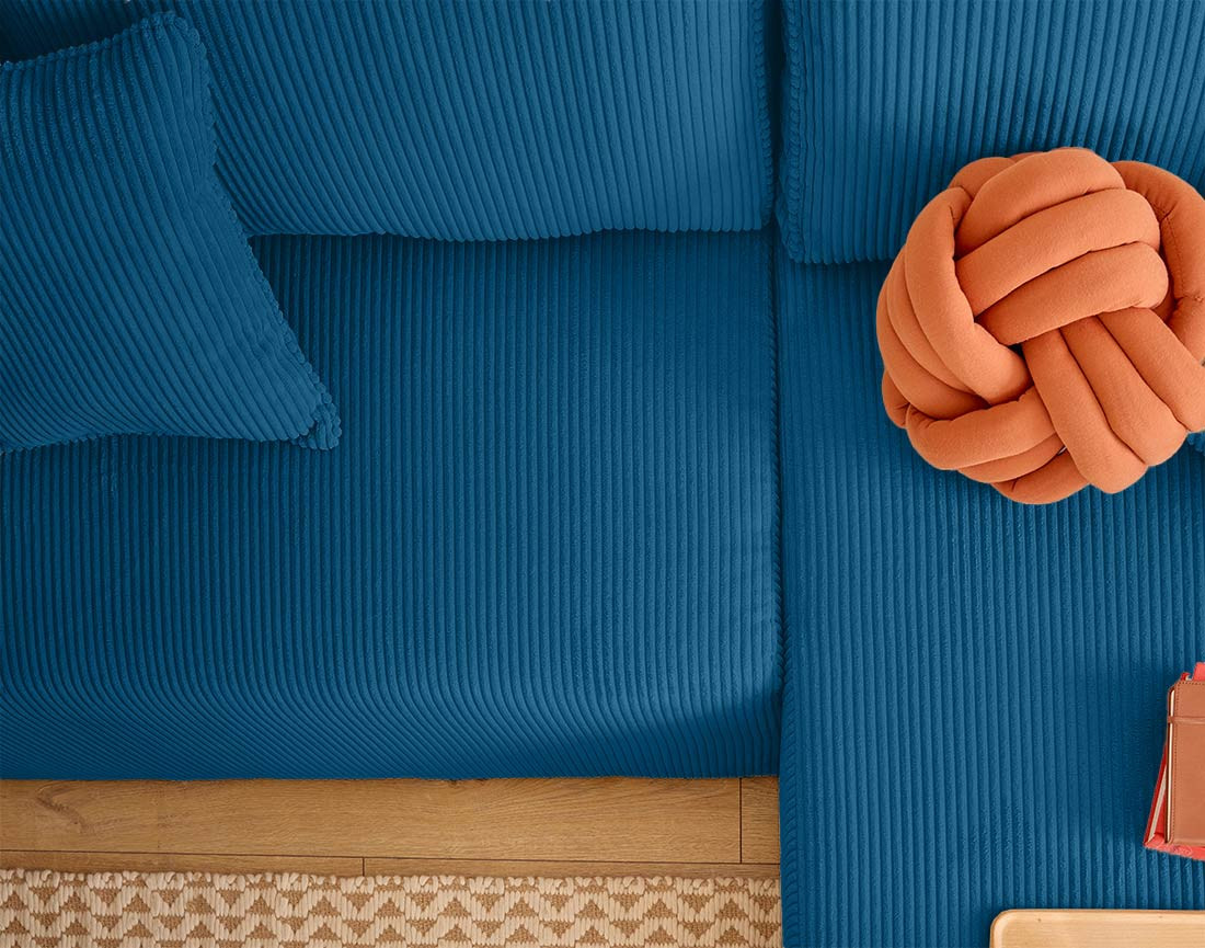 Canapé d'angle convertible en velours côtelé avec poufs Topaze