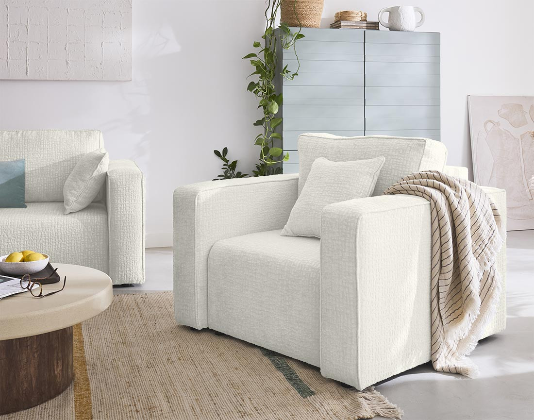 Fauteuil en tissu velours relief Topaze