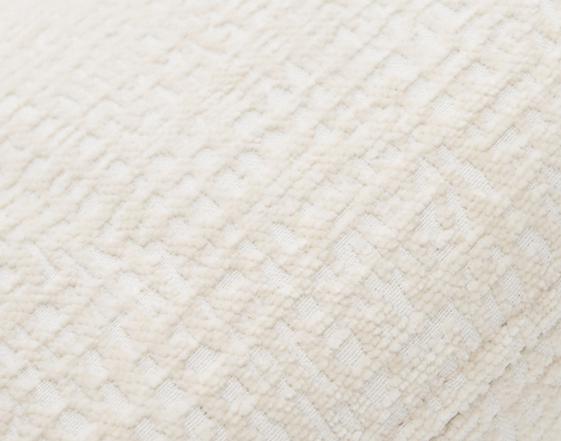 Pouf en tissu velours relief Bastille