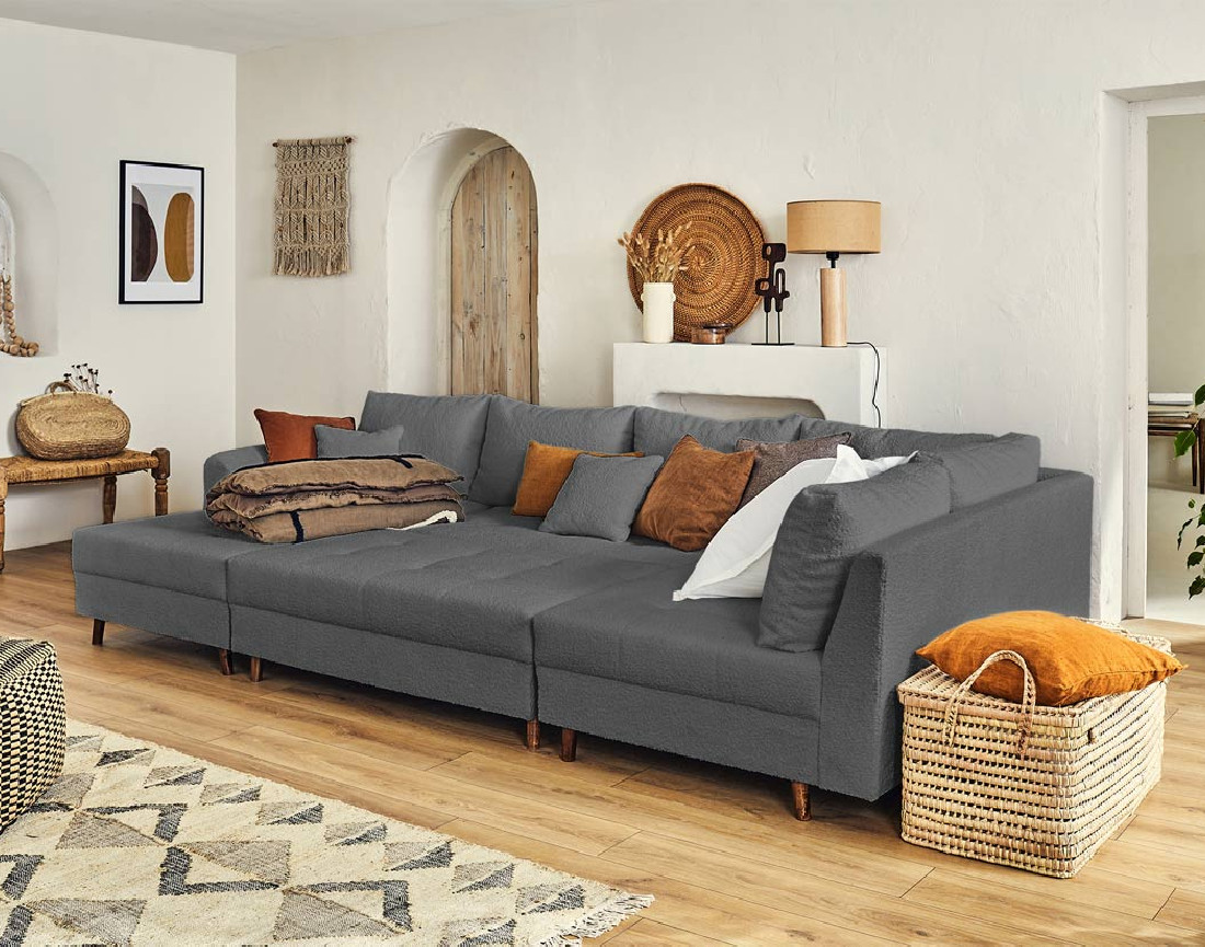 Canapé panoramique d'angle droit 7 places avec pouf d'appoint en tissu bouclette Rune