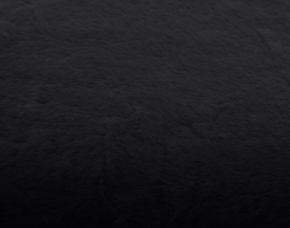 Coussin en fausse fourrure 60x60 cm Oscar