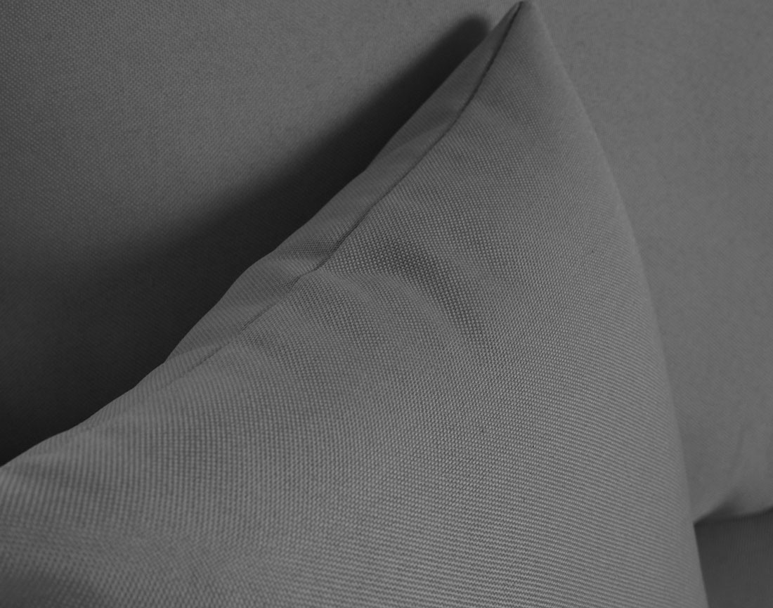 Canapé d'angle réversible 4 places convertible avec coffre en tissu Regala