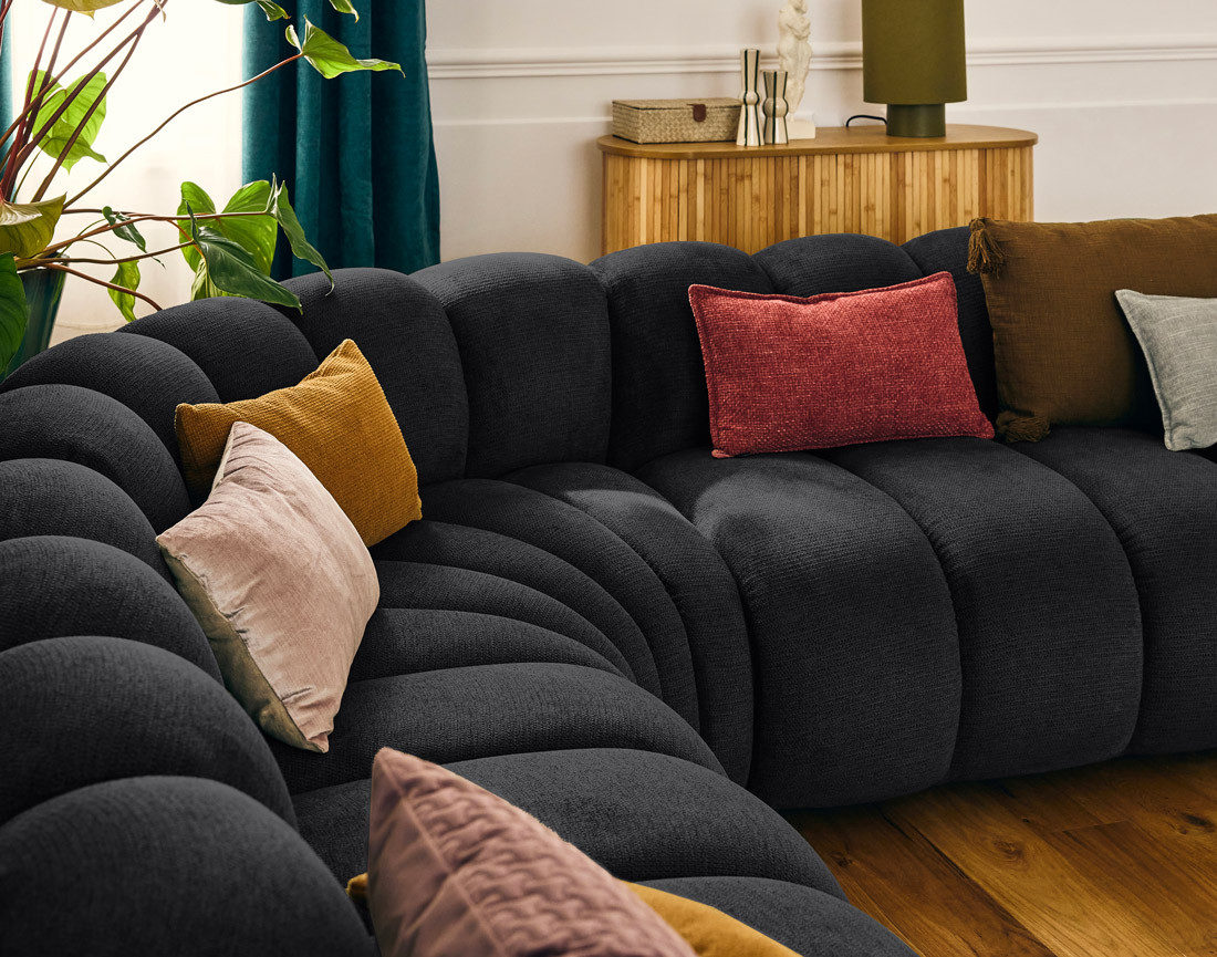 Canapé modulable d'angle droit 5 places en tissu texturé Debbie