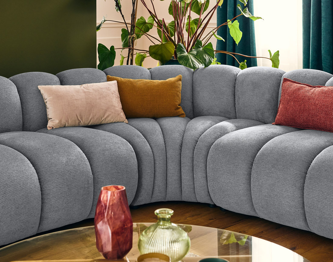 Canapé modulable d'angle droit 5 places en tissu texturé Debbie