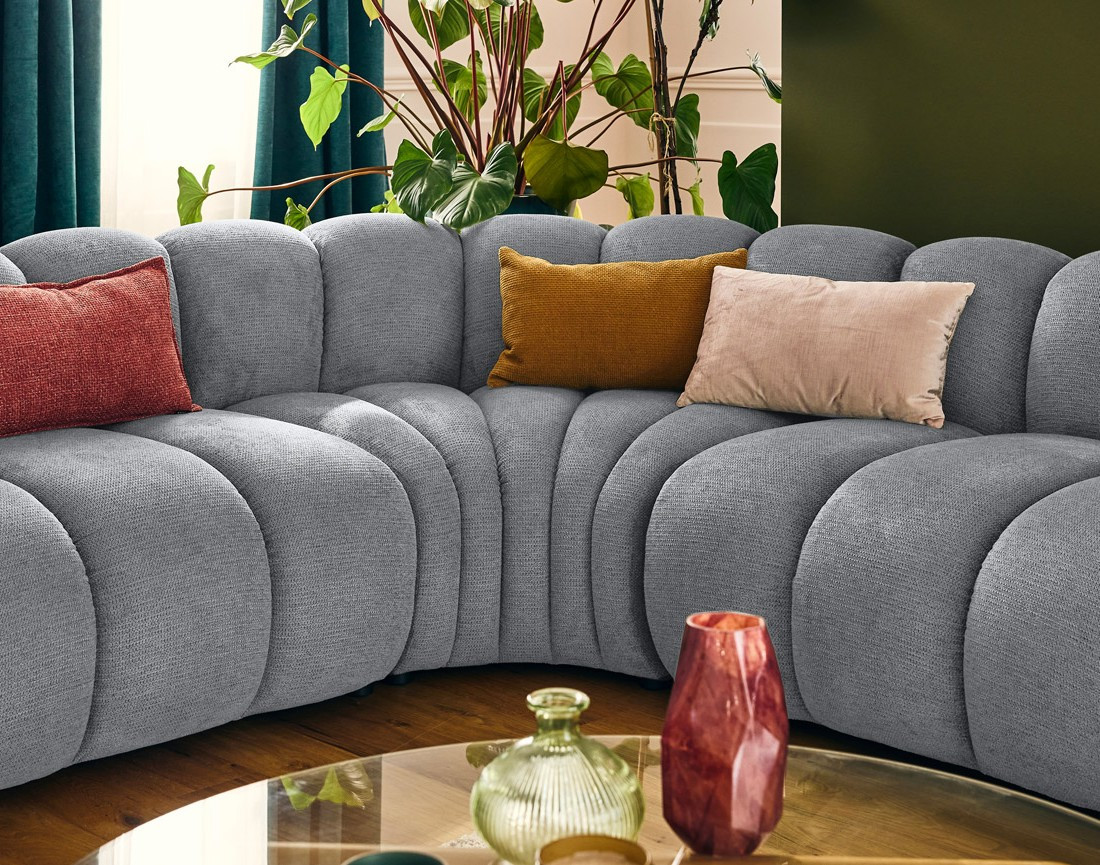 Canapé modulable d'angle gauche 5 places en tissu texturé Debbie