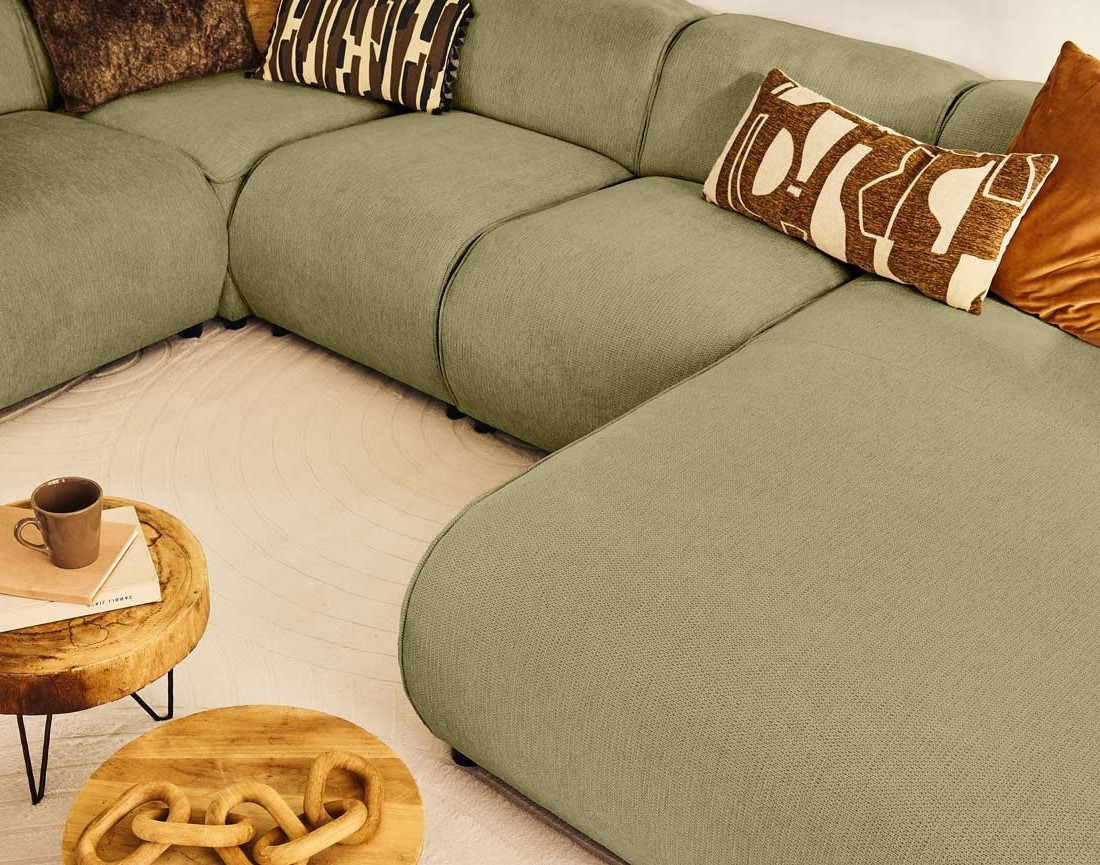 Canapé modulable panoramique d'angle gauche 7 places en tissu texturé Suaro